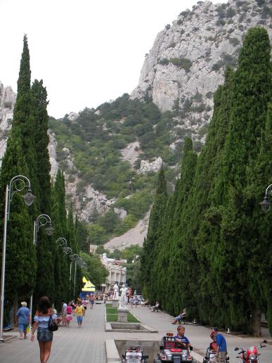 Pyramidal cypress alley with statues in Simeiz in Crimea